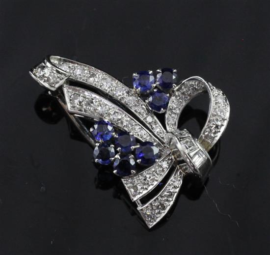 A white gold, sapphire and diamond brooch, 1.25in.